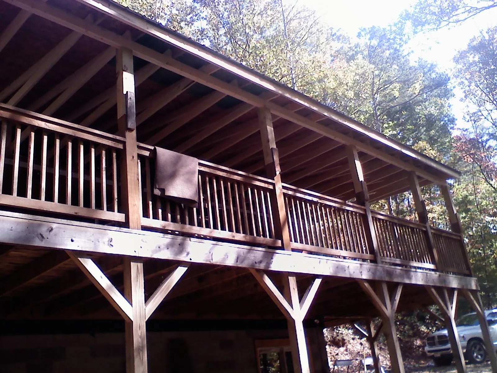 Timber framing under a new elevated porch and deck — Roof Leak Repair in Starbuck by Roofing Brothers
